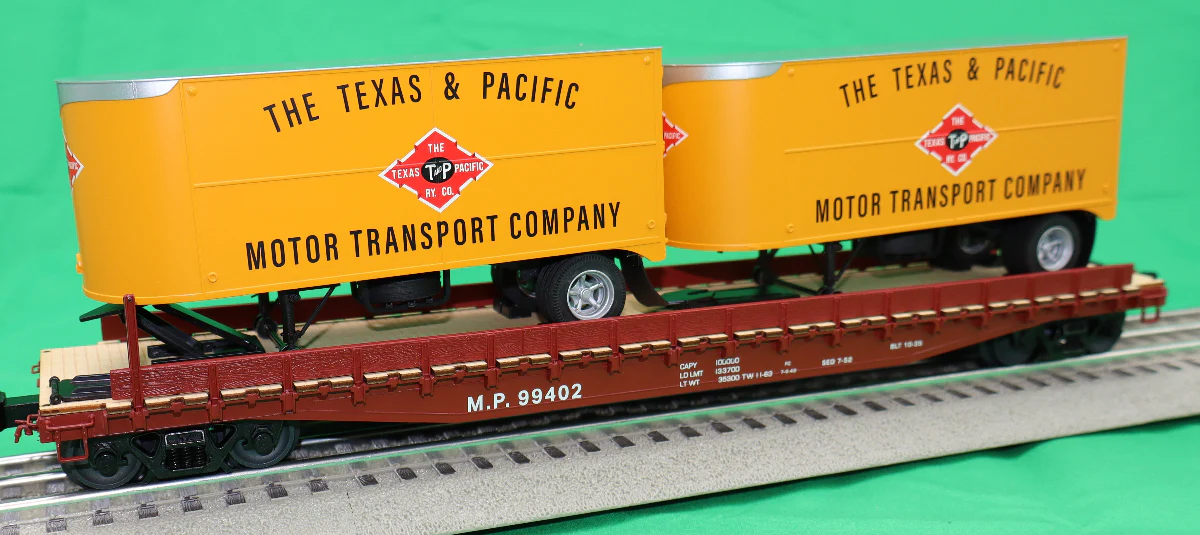 Lionel 2426750 - 50' Flatcar "Texas & Pacific" w/ 20' Trailers #99402