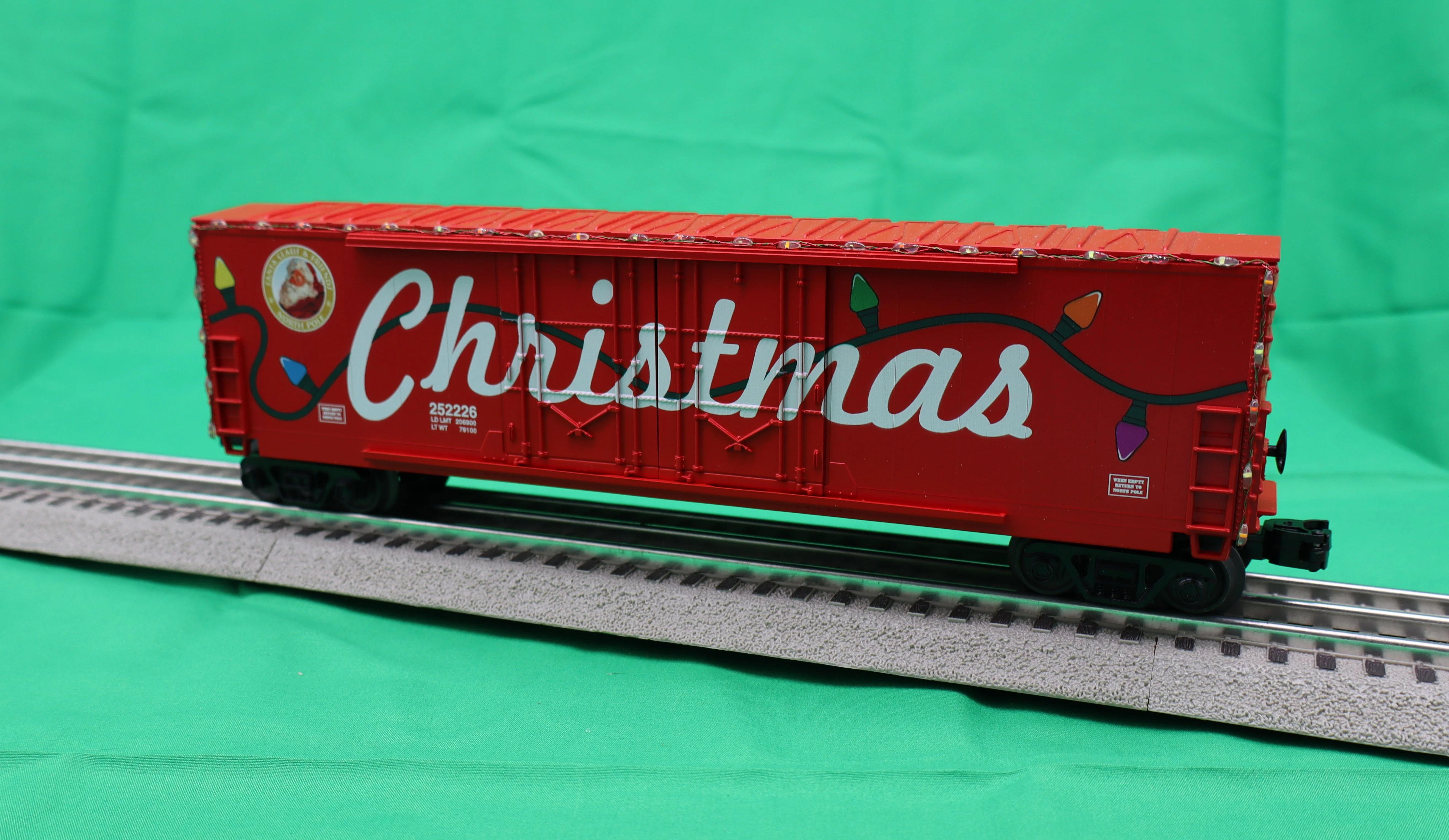 MTH 30-70131 - 50’ Double Door Plugged Boxcar Set "Christmas" w/ LED Lights (4-Car) - Image 5