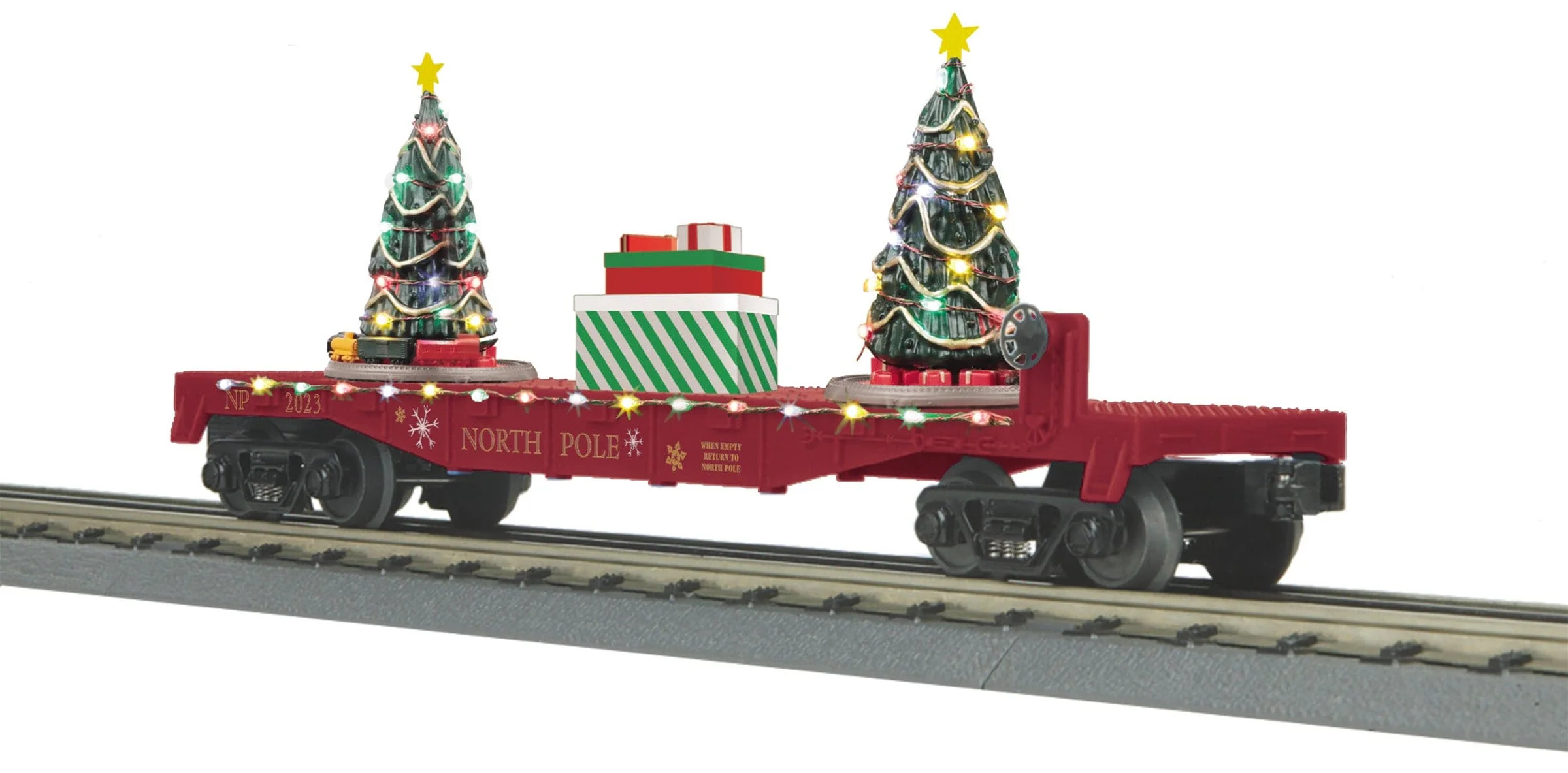 MTH 30-76867 - Flat Car "North Pole" #2023 w/ Lighted Christmas Trees (Maroon) - Image 4